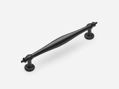 Solid brass Bougie drawer pull, 6 inches, in a matte black finish for cabinets.