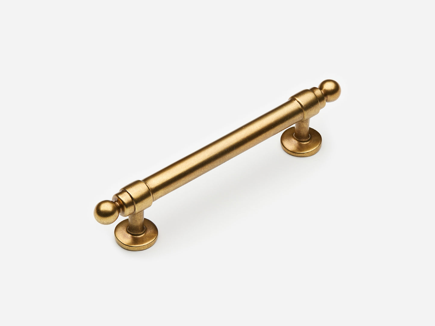 Solid brass Campaign drawer pull, 4 inches, in an aged brass finish for cabinets.