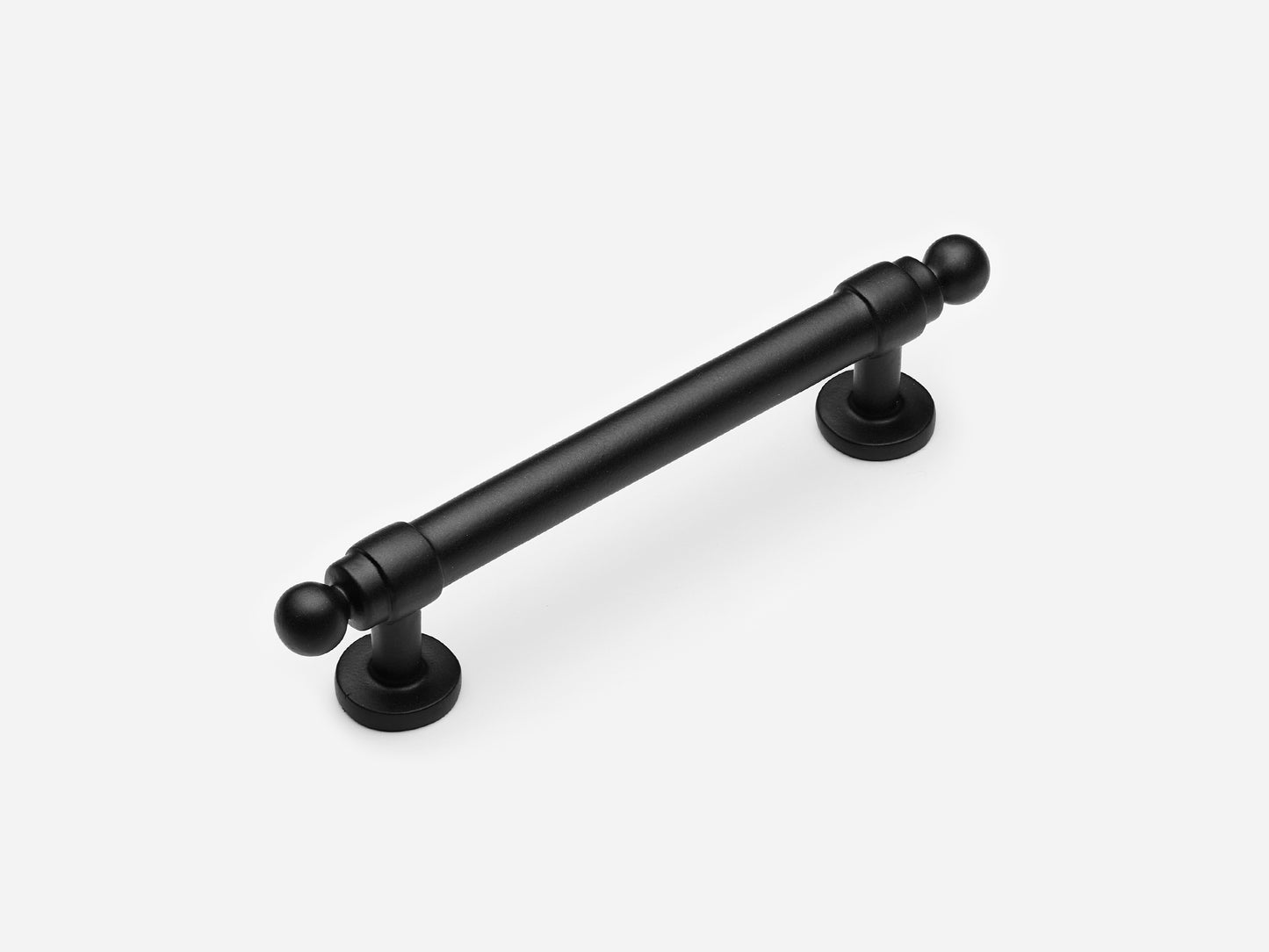 Solid brass Campaign drawer pull, 4 inches, in a matte black finish for cabinets.
