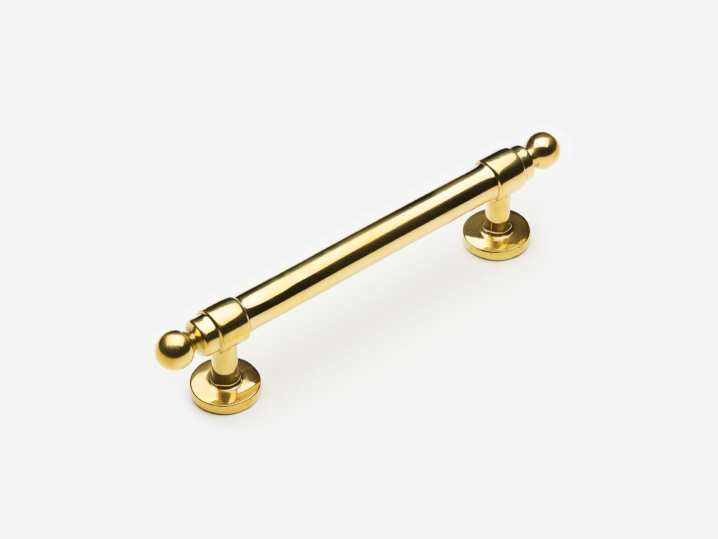 Solid brass Campaign drawer pull, 4 inches, in an unlacquered polished brass finish for cabinets.