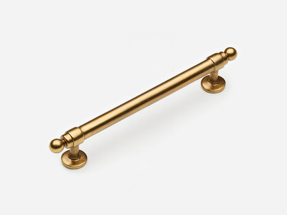 Solid brass Campaign drawer pull, 6 inches, in an aged brass finish for cabinets.
