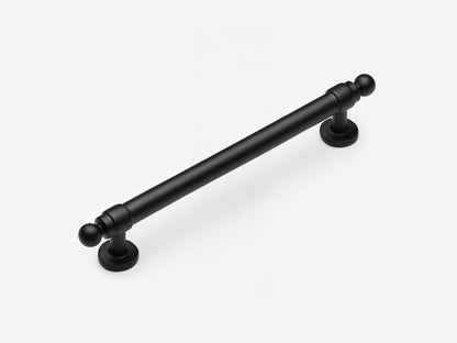 Solid brass Campaign drawer pull, 6 inches, in a matte black finish for cabinets.