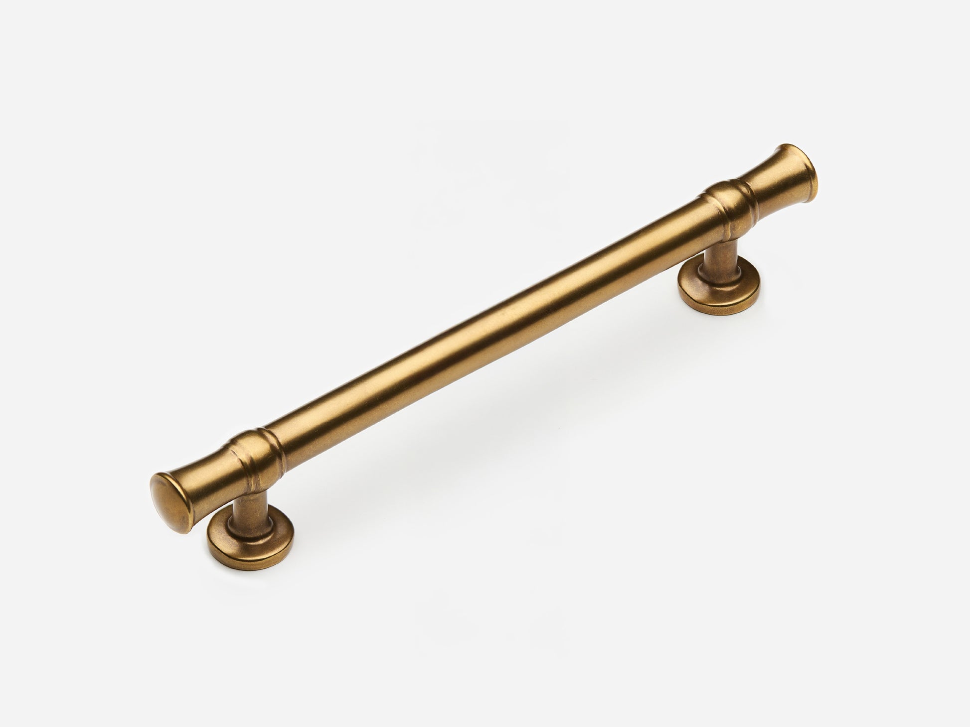 Solid brass Heritage drawer pull, 6 inches, in an aged brass finish for cabinets.