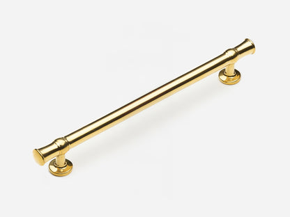 Solid brass Heritage drawer pull, 8 inches, in an unlacquered polished brass finish for cabinets.