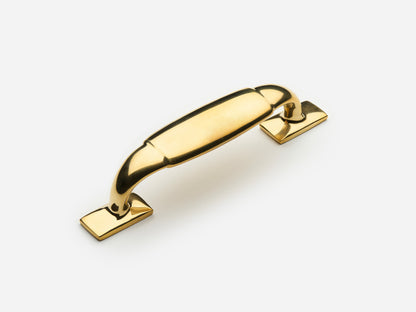 Solid brass Packard drawer pull, 4 inches, in an unlacquered polished brass finish for cabinets.