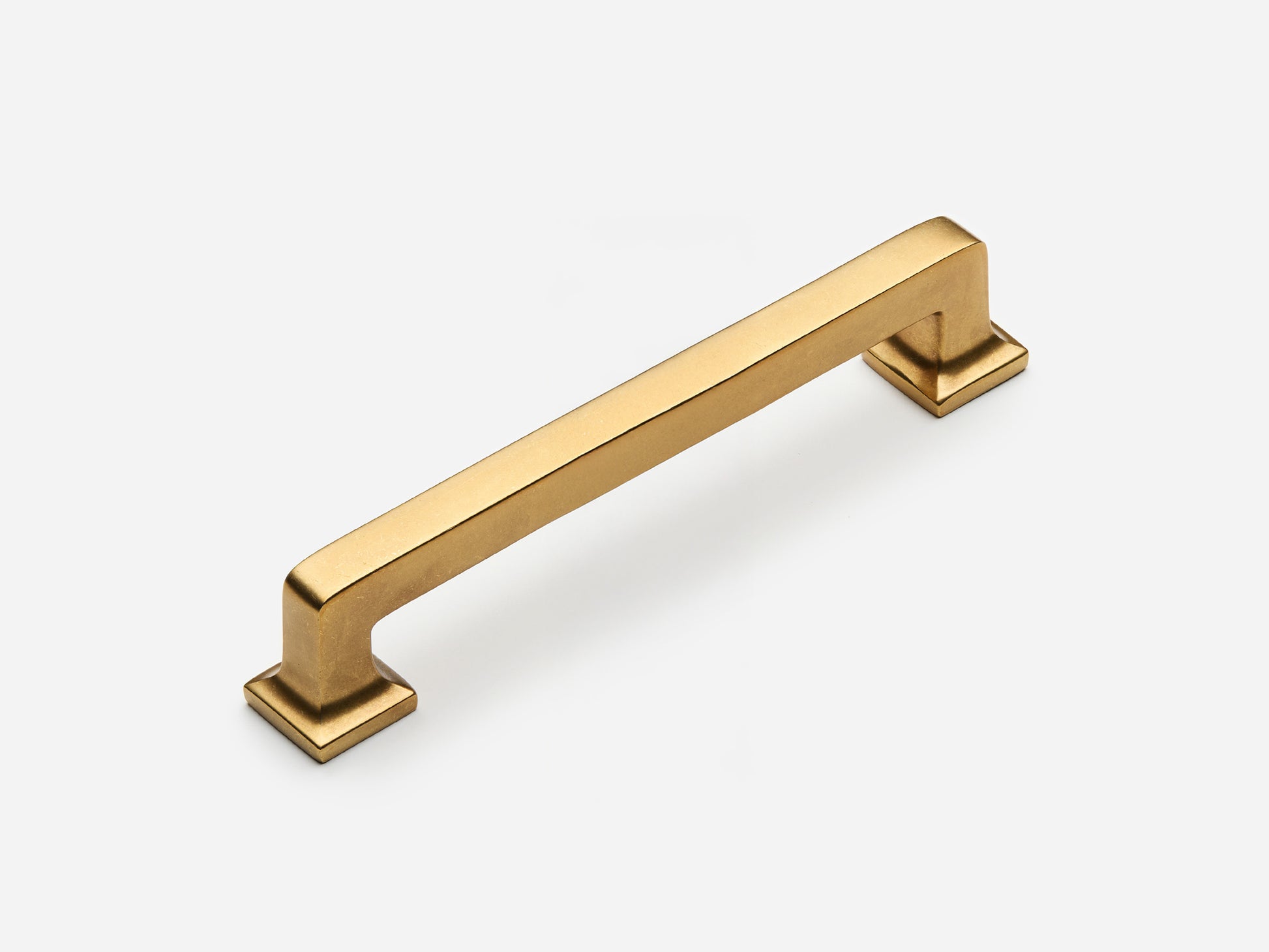 Solid brass Promontory drawer pull, 6 inches, in an aged brass finish for cabinets.