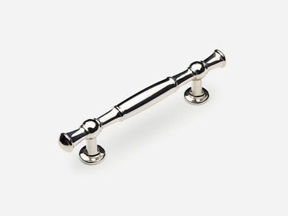 Solid brass Windsor drawer pull, 4 inches, in a polished nickel finish for cabinets.
