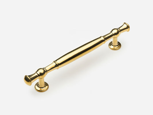 Solid brass Windsor drawer pull, 6 inches, in an unlacquered polished brass finish for cabinets.