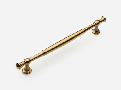 Solid brass Windsor drawer pull, 8 inches, in an aged brass finish for cabinets.