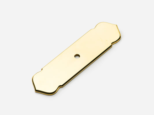 Solid brass France backplate, 1x4 inches, in an unlacquered polished brass finish for knobs on cabinets.