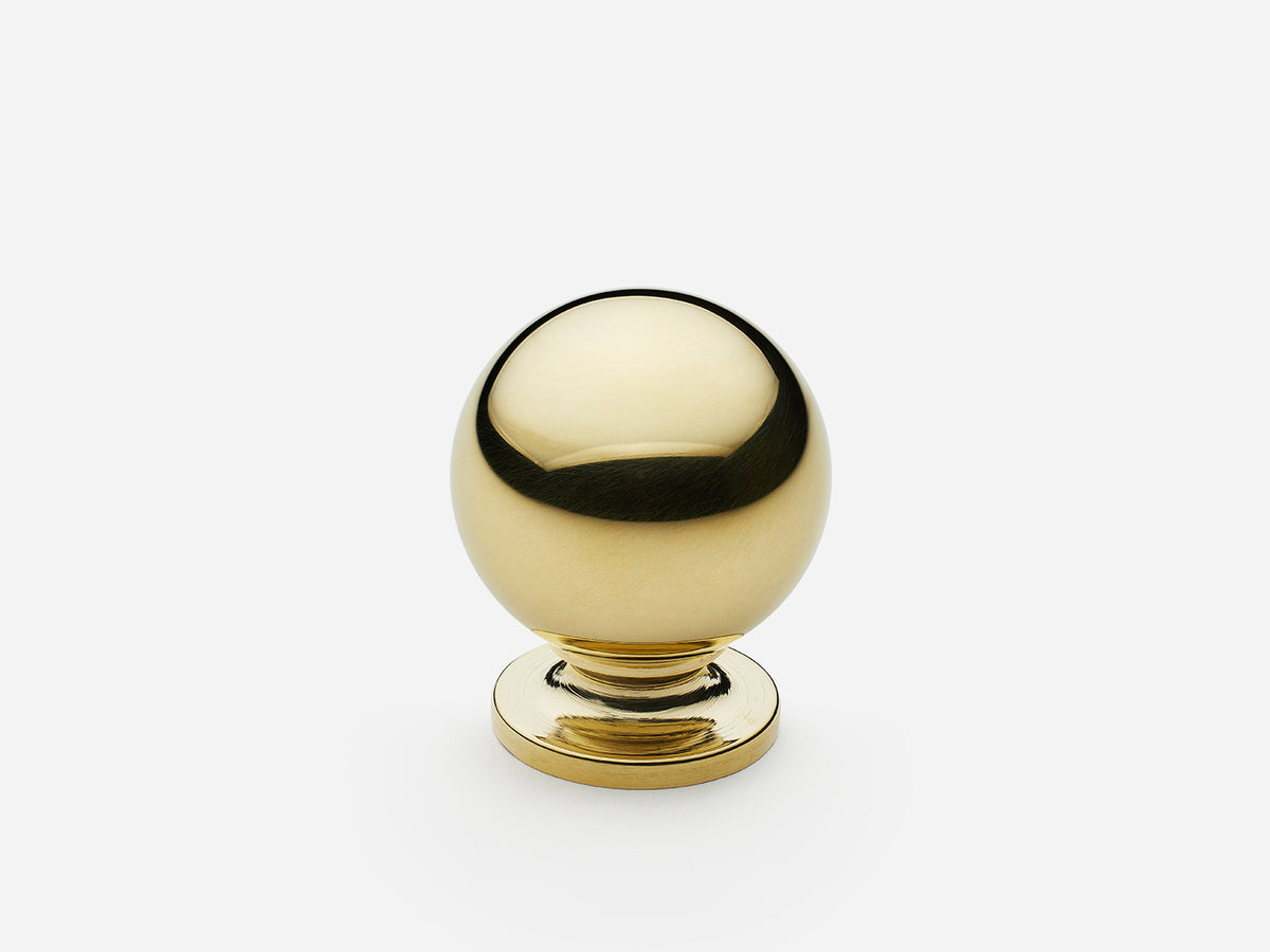 Solid brass Luxe Ball Knob, standard size, in a polished unlacquered brass finish for cabinets.