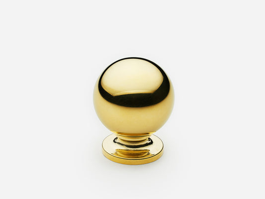 Solid brass Luxe Ball Knob, standard size, in a polished unlacquered brass finish for cabinets.