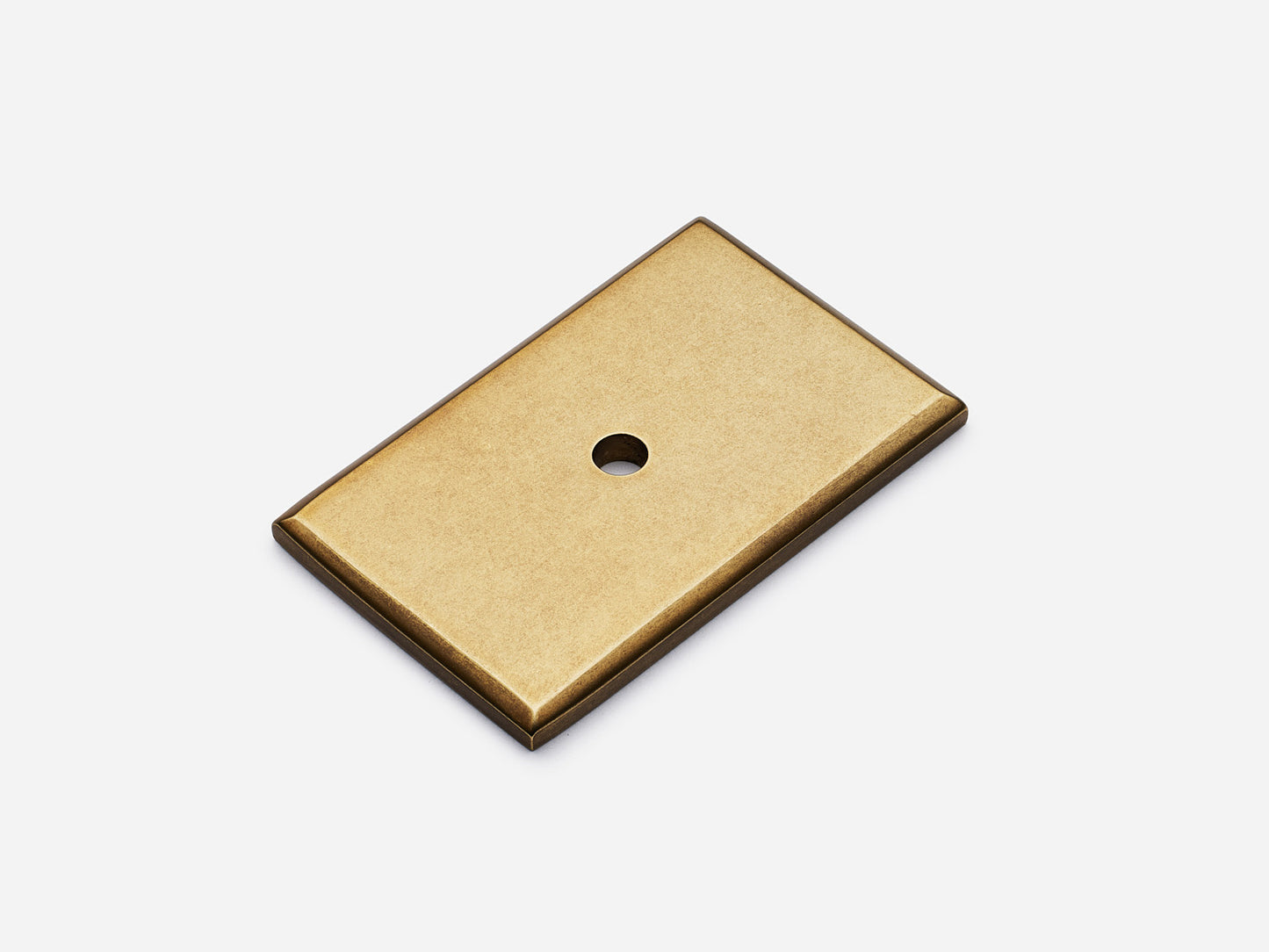 Solid brass rectangular backplate, 1.25x2 inches, aged brass finish for knobs and pulls on cabinets.