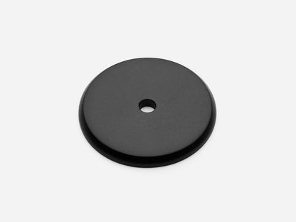 Solid brass Round backplate, 1.5 inches, in a matte black finish for knobs on cabinets.