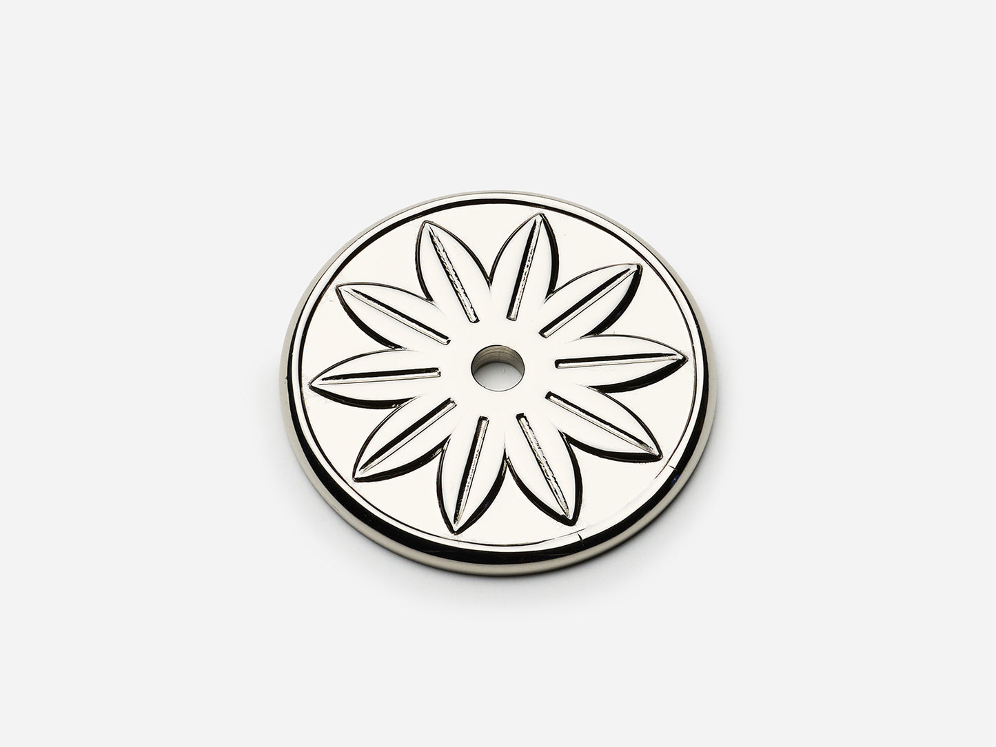 Solid brass Starflower backplate, 1.75 inches, in a polished nickel finish for knobs on cabinets.