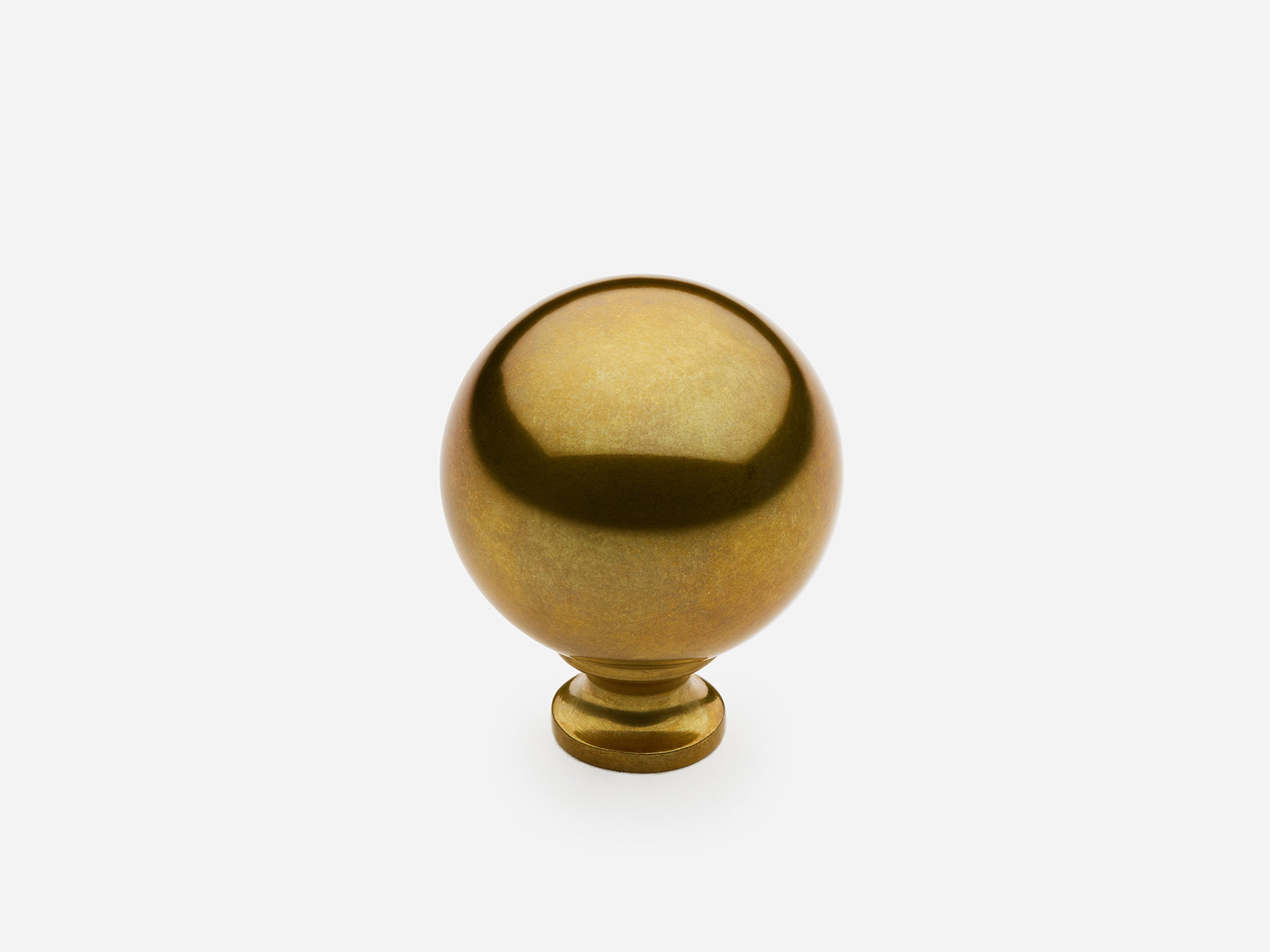 Solid brass Ball Knob, standard size, in an unlacquered aged brass finish for cabinets.