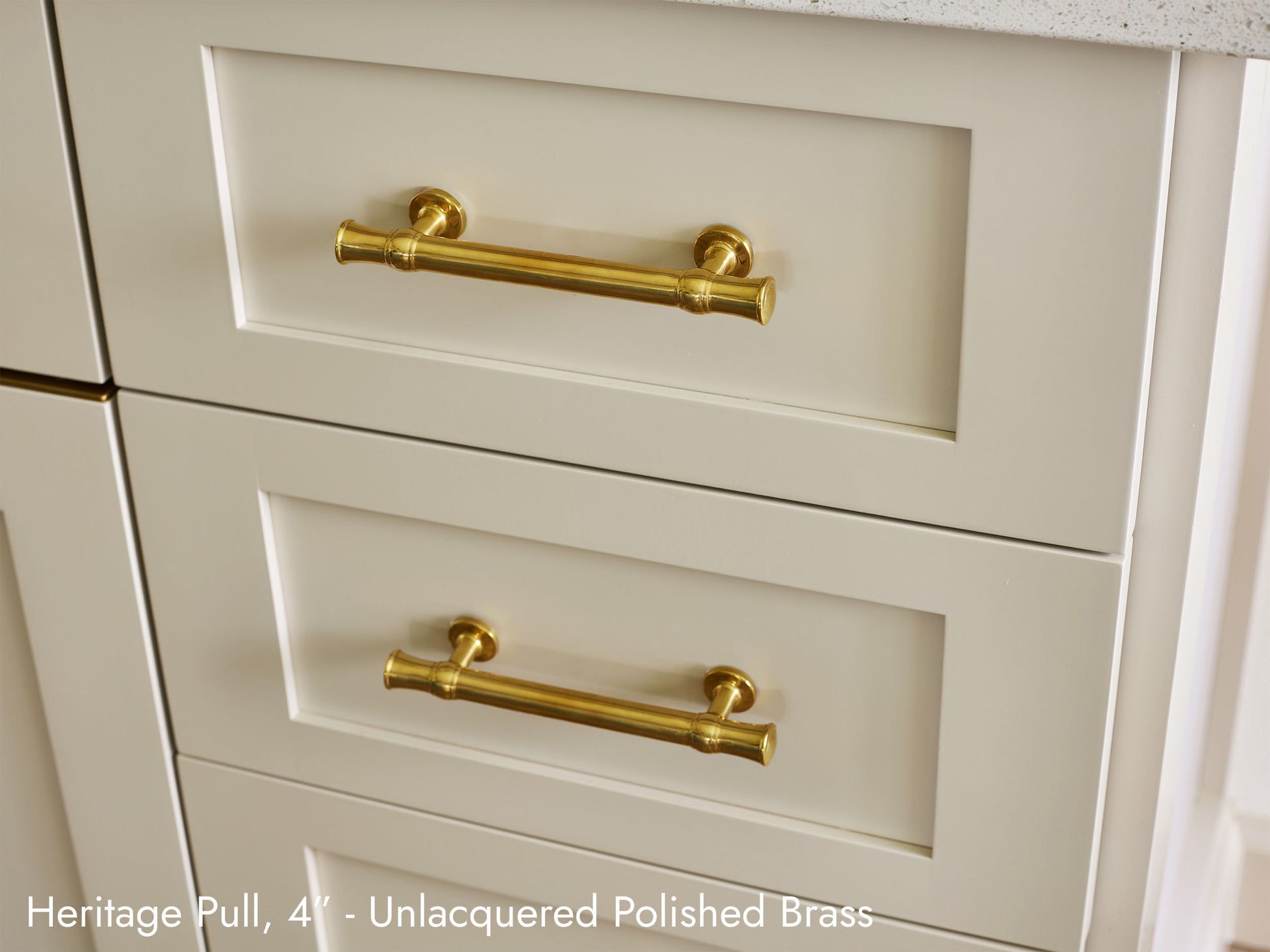Solid brass Heritage drawer pull, 4 inches, in an unlacquered polished brass finish for cabinets.