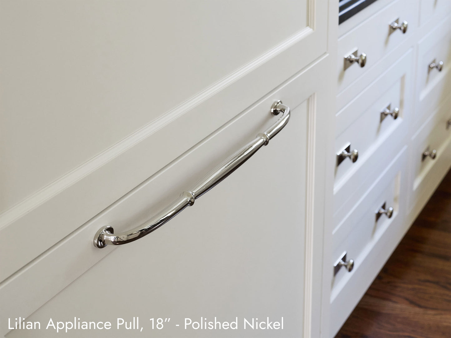 Solid brass Lilian Pulls, in a polished nickel finish, on kitchen cabinets.