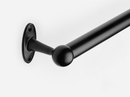 Solid brass Newark towel bar in a matte black finish for kitchens and bathrooms.