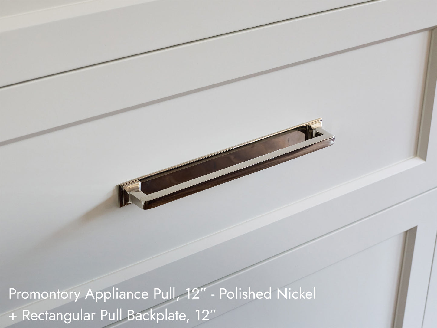 Solid brass Promontory Pull, in polished nickel finish, on kitchen cabinets.