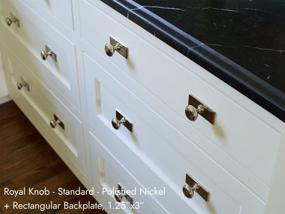 Solid brass Royal Knob, in polished nickel, with a Rectangular backplate.